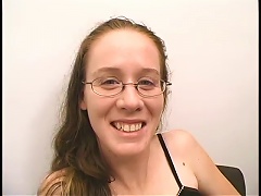 nerdy girl in glasses gives a  in an amateur clip